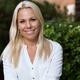 Portrait of a young smiling woman with blond hair... (thumbnail)