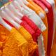 Colorful clothes on hangers... (thumbnail)