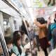 People riding a subway train abstract out-of-focus background... (thumbnail)