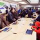 People at Apple store trying new iPhones... (thumbnail)