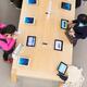 People at Apple store trying new iPads... (thumbnail)