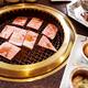 Beef being cooked on grill at Japanese restaurant... (thumbnail)