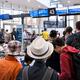 People at airport gate... (thumbnail)