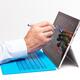 Hand with a pen touching Microsoft tablet Surface Pro 3 display... (thumbnail)