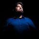 Portrait of a man looking up at the light... (thumbnail)