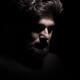 Dramatic shadowy portrait of thoughtful man... (thumbnail)