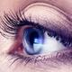 Closeup of woman eye with blue screen reflecting in it... (thumbnail)