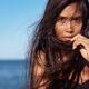Expressive portrait of young exotic woman with long wet brown hair... (thumbnail)