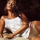 Sexy young woman lying on beach sand... (thumbnail)
