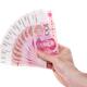 Hand holding Chinese Yuan money bills... (thumbnail)