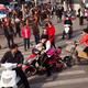 People and traffic at intersection in China... (thumbnail)