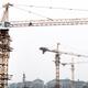 Construction cranes in Zhengzhou China... (thumbnail)