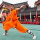 Shaolin Kung Fu student performing with broad sword... (thumbnail)