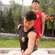 Students of Shaolin martial arts school conditioning their hands... (thumbnail)