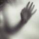 Woman blurred hand behind glass... (thumbnail)
