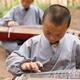 Shaolin martial arts school students playing guzheng... (thumbnail)