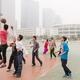 Students playing basketball in China... (thumbnail)