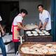 Family business selling bread at market in China... (thumbnail)