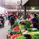 People selling vegetables at food market in China... (thumbnail)