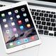 Apple iPad Mini 3 tablet on laptop computer... (thumbnail)