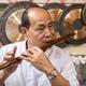 Music store owner plays flute... (thumbnail)