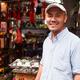 Shop owner at antique market in Shanghai, China... (thumbnail)