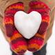 Heart made of snow in woman hands... (thumbnail)