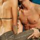 Sensual young couple kissing on the beach... (thumbnail)