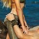 Sexy young couple making love on the beach... (thumbnail)