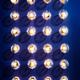 Illuminated light bulbs on blue background... (thumbnail)