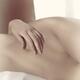 Closeup of nude woman body in bed sepia toned... (thumbnail)