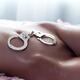 Handcuffs on nude woman body... (thumbnail)