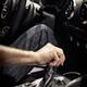 Person hand on a car gear stick... (thumbnail)