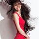 Smiling asian woman with long flying black hair... (thumbnail)