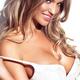 Sexy young teasing woman with long blond hair wearing a bra beauty por... (thumbnail)
