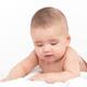 Cute thoughtful baby looking down... (thumbnail)