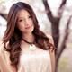 Beauty portrait of asian woman with long hair in park with cherry blos... (thumbnail)