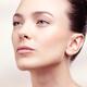 Beauty portrait of woman with clean natural look and updo hairstyle... (thumbnail)