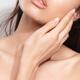 Beauty face closeup of young woman hand and lips... (thumbnail)