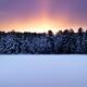 Atmospheric glowing red sunset winter nature scenery... (thumbnail)
