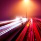 Highway traffic light trails in fog at nighttime... (thumbnail)