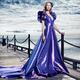 Young woman in beautiful long evening gown at waterfront... (thumbnail)