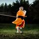 Shaolin warrior monk spinning with a staff... (thumbnail)