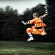 Shaolin warrior monk martial artist in mid-air with a sword... (thumbnail)