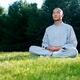 Buddhist monk meditating during sunrise... (thumbnail)