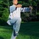 Shaolin monk practicing Qi Gong in the nature... (thumbnail)