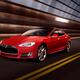 Red Tesla Model S red luxury electric car speeding in a tunnel... (thumbnail)