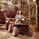 Young farm woman riding atv... (thumbnail)