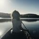 Woman canoeing on a lake... (thumbnail)