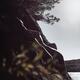 Nude woman lying on rocks in sunshine... (thumbnail)